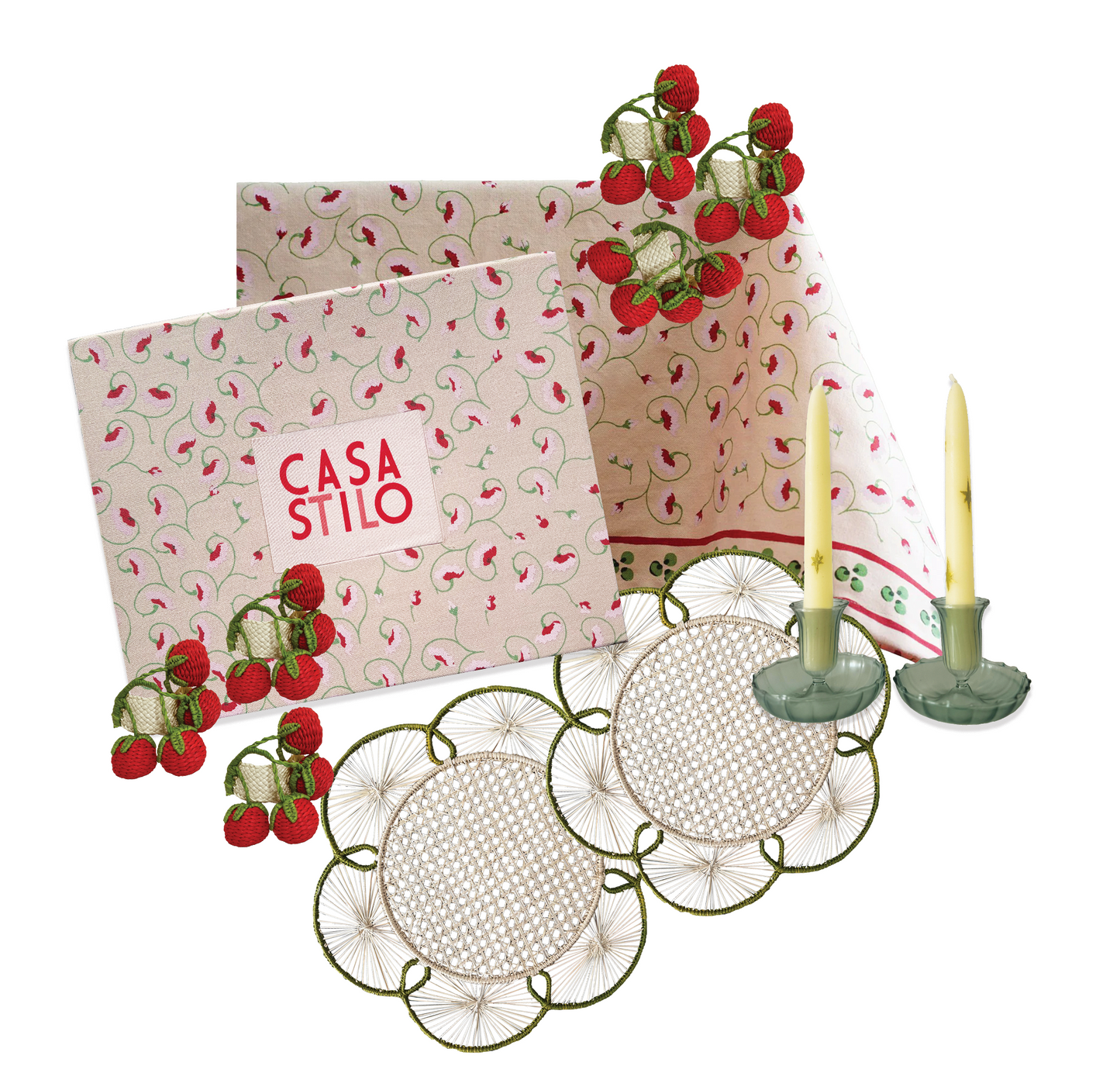 Decorative reusable box with iraca chargers, pomodori napkin rings and a pair of fluted candle holders