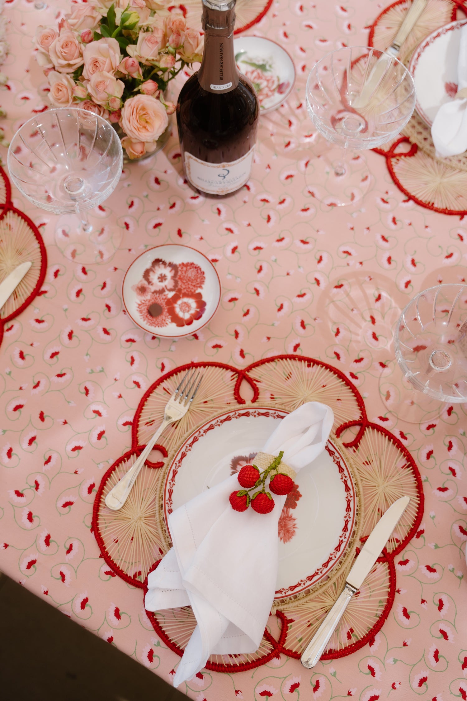 Pink hand-screen printed table linens inspired by Tuscany, designed for romantic entertaining and elevated dining.