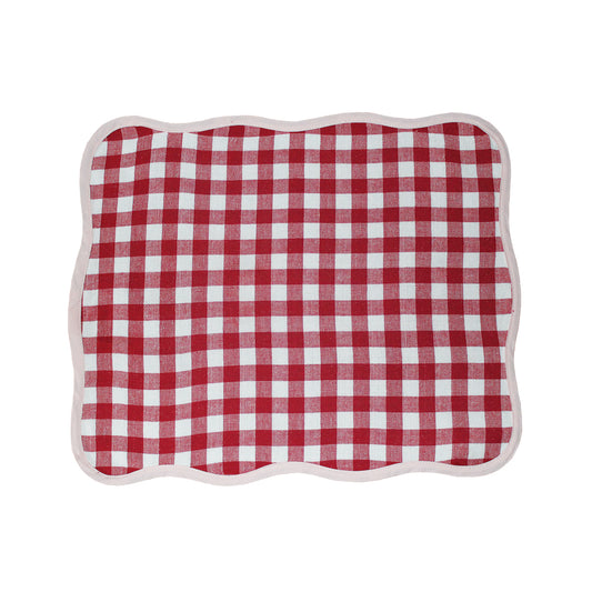 Red and white scalloped placemat. Reversible cotton, with pink and white gingham on the opposite side. 
