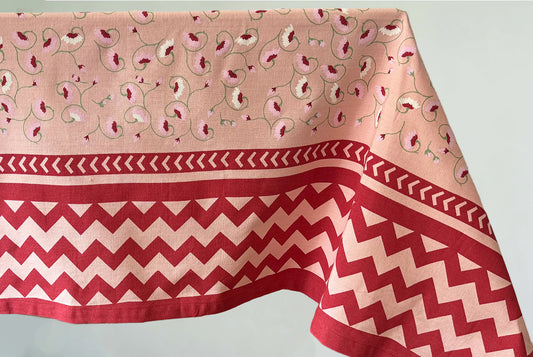 Handscreen printed tablecloth in dark pink, floral and geometric motifs on cotton 