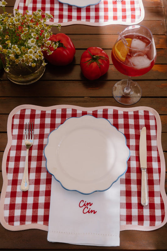 Aperitivo table setting with embroidered “Cin Cin” napkin