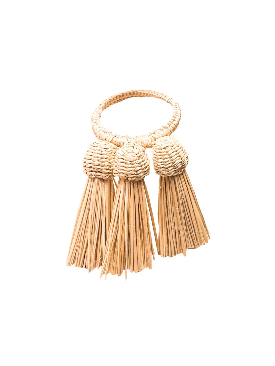 Handwoven iraca palm tassel napkin rings with raffia fringe detail