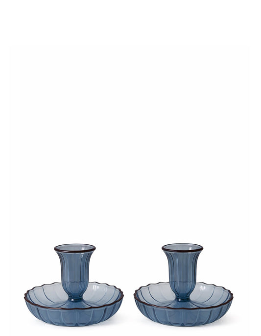 Decorative blue candlestick holders with contrast trim